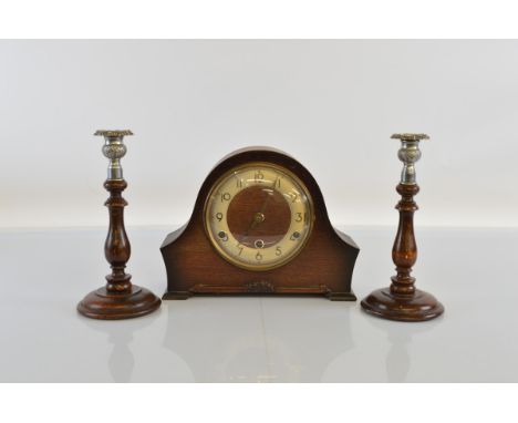 An oak cased Bentima mantle clock, with eight day striking movement, with pendulum and key. 29.5cm wide. Together with a pair