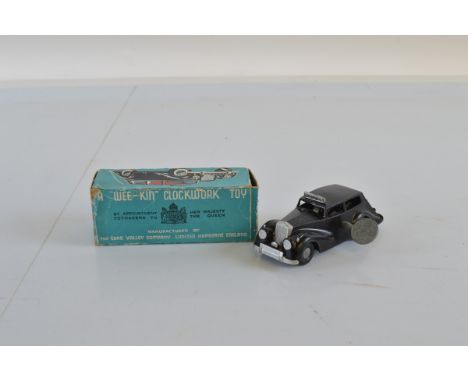 A boxed Chad Valley Wee-Kin Police Car, with key and original box
