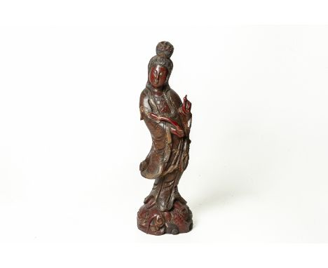 A LARGE CARVED WOOD FIGURE OF GUANYIN
Modelled standing on a lotus, holding a ruyi sceptre and pearl
93cm high
Condition: Con