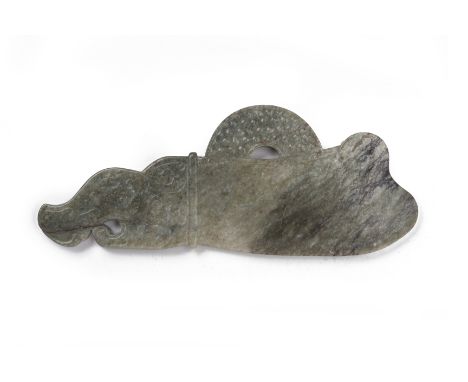 AN ARCHAIC STYLE JADE CARVING
In the form of a stylised dagger
23cm long
Condition: For a condition report or further images 