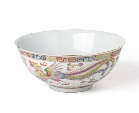 A FAMILLE ROSE DRAGON AND PHOENIX BOWL
The exterior decorated with a dragon and a phoenix amongst clouds charing a flaming pe
