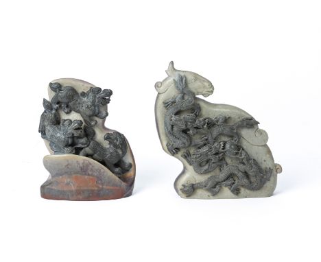 TWO HARDSTONE CARVINGS OF DRAGONS
One example depicting playful dragons and mythical beasts in relief, the other of dragons c