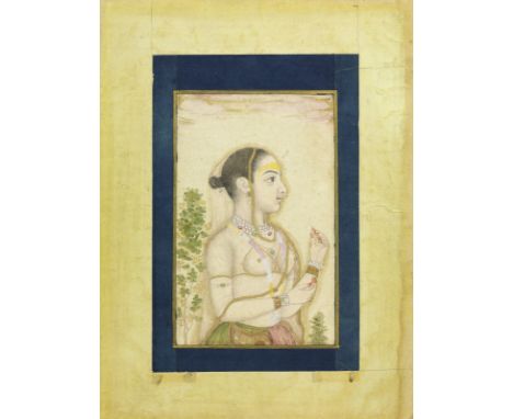 Indian Art A portrait of a young lady India, Rajasthan, 18th-19th century Ink, pigments and gold on paper . . Cm 11,50 x 18,0