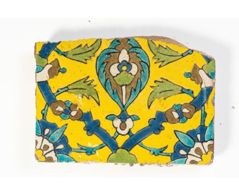 Islamic Art A cuerda seca pottery tile fragment Safavid Iran, 17th century  . . Cm 17,00 x 24,00.