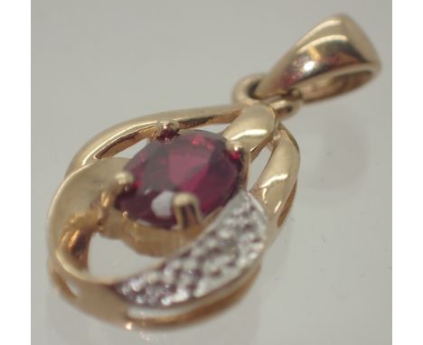 9ct gold synthetic ruby and diamond pendant