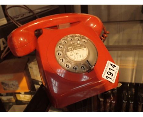 Vintage red dial telephone