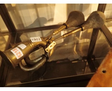 Two brass vintage style car horns