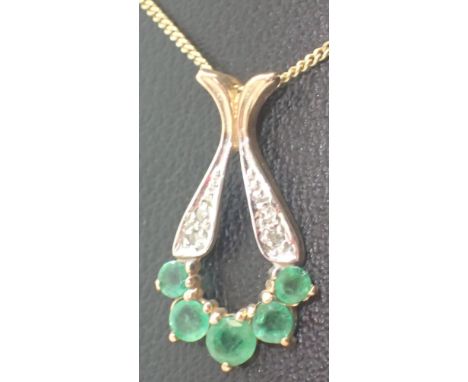 9ct gold emerald and diamond pendant on 9ct gold necklace CONDITION REPORT: Chain L: 45 cm 1.3g, pendant 1.1g.