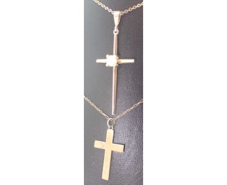 Presumed 9ct gold opal set cross on a 9ct gold chain and a further 9ct gold cross and chain 5.7g in total