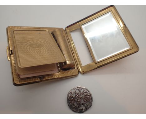 Silver brooch and a Kigu ladies compact with lipstick holder
