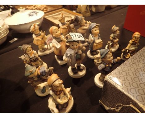 Twelve Hummel and Goebel figurines including rare examples