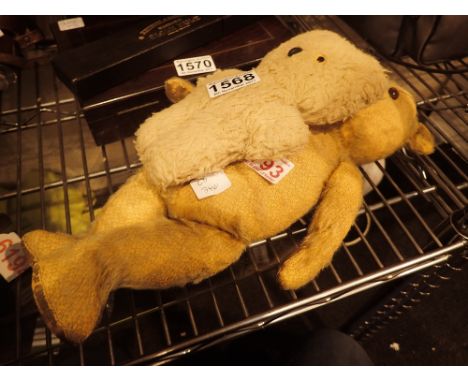 Two vintage teddy bears one with growler