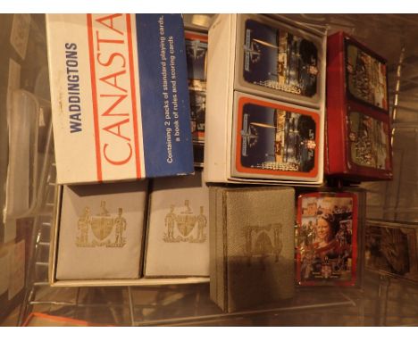 Box of mostly unused playing cards including Festival of Britain