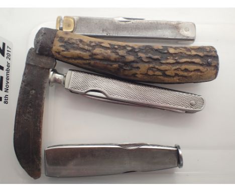 Three pipe smokers penknives and an antler handled example