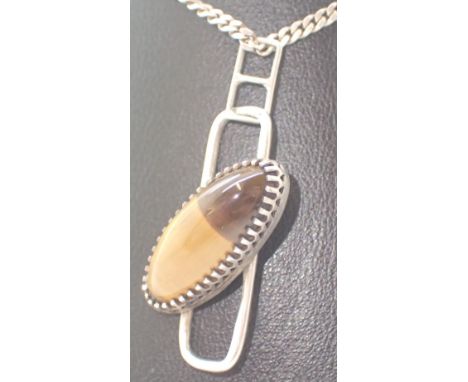 Hallmarked silver tigers eye pendant on a silver curb chain