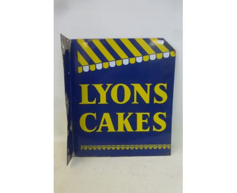 A Lyons Cakes double sided enamel sign with hanging flange and unusual awning design, 12 x 14".