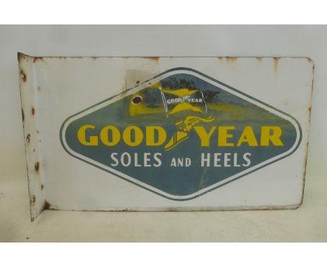A Goodyear Soles and Heels double sided enamel sign, with hanging flange, 21 x 12".