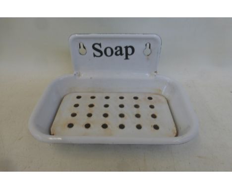 An enamel soap dish.