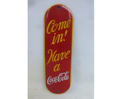 A Coca-Cola enamel finger plate with some professional restoration to the upper section, 3 1/2 x 11 3/4"