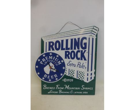 A Rolling Rock enamel clock.