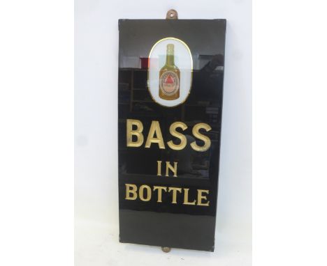A Bass in Bottle slate pub sign with unusual enamel insert and of large size, 12 x 27".