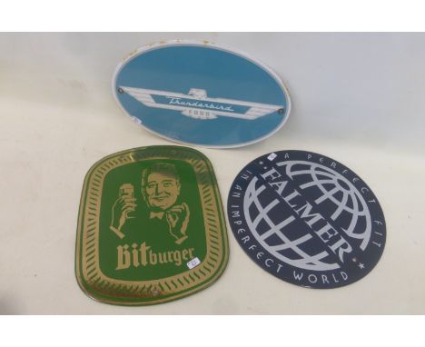 A small reproduction oval enamel sign, advertising Ford Thunderbird and two others. 