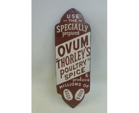 An Ovum Thorley's Poultry Spice enamel finger plate, heavily restored, 3 1/4 x 9 1/2".