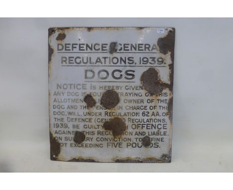 An enamel sign advertising Defence General Regulations, 1939 'Dogs', 12 x 13".