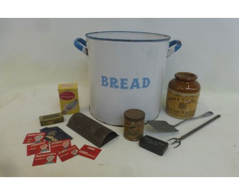 A large enamel bread bin, lacking lid, a stoneware jar with Crosse & Blackwell's Pickled Walnuts label and various kitchenali