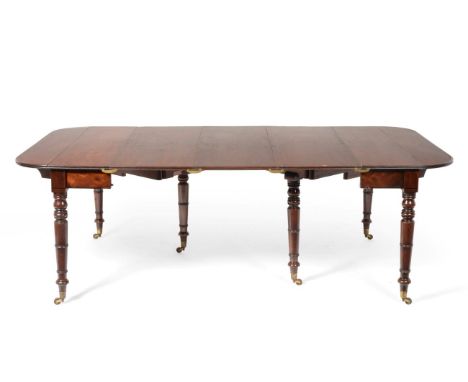 A Good Regency Mahogany Telescopic Extending Dining Table, early 19th century, with three original additional leaves and two 