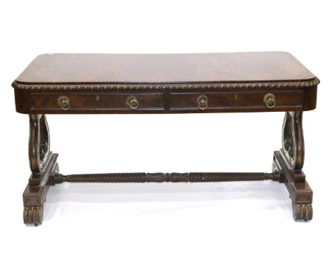 A Fine William IV Irish Mahogany Library Table, in the style of Williams & Gibton, the finely figured rectangular top with ca