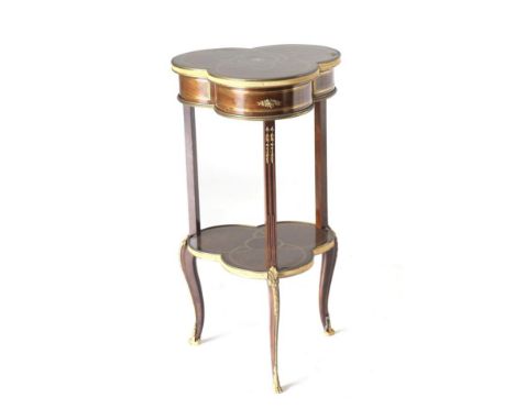 A Mahogany and Brass Inlaid Tables à Ouvrage, late 19th century, in Louis XVI style, with hinged lid enclosing a rosewood ban