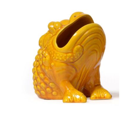A Burmantofts Faience Pottery Toad Spoon Warmer, modelled seated with open mouth, mustard glaze, impressed BF, circular paper