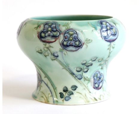 William Moorcroft (British, 1872-1945): for Liberty & Co, A Tudor Rose Pattern Vase, on a jade ground, green painted signatur