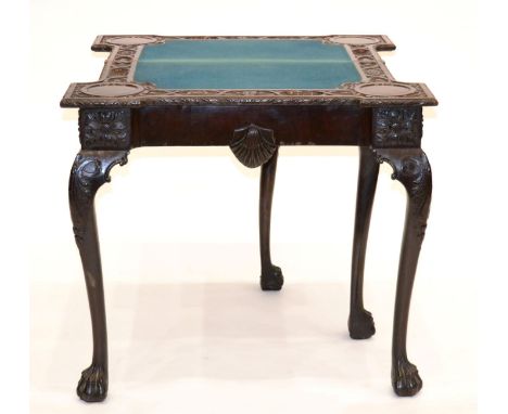 A Carved Mahogany Foldover Card Table, in George I Irish style, labelled R Strahan & Co Ltd, Cabinet Makers and Upholsterers,