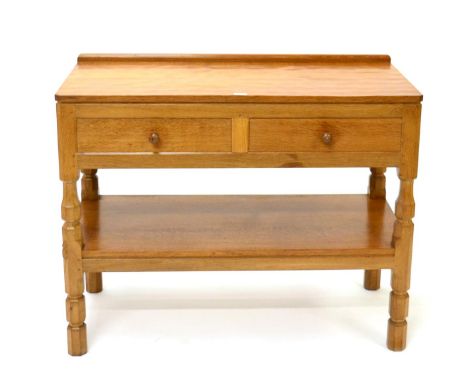 Mouseman: A Robert Thompson English Oak Serving Table, the raised upstand above two drawers with undertier shelf, on four tur