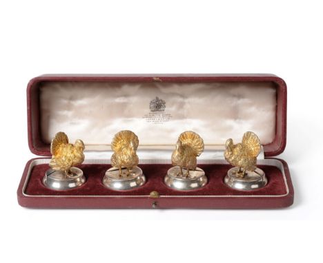 A Set of Four Edwardian Parcel-Gilt Silver Novelty Turkey Menu Card Holders, W & G Neal, London 1908, retailed by Asprey & Co