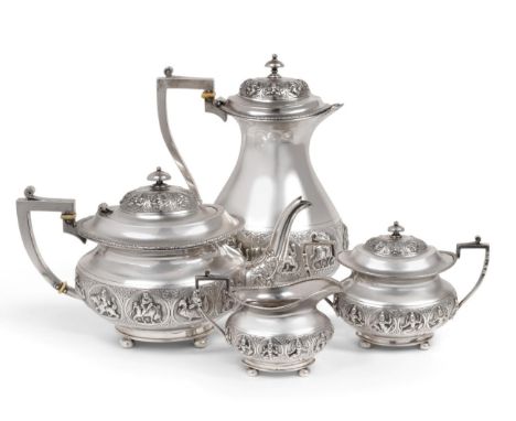 An Indian Silver Four Piece Tea Service, Tarachund Parsram, Bombay, early 20th century, oval on four ball supports, the hot w