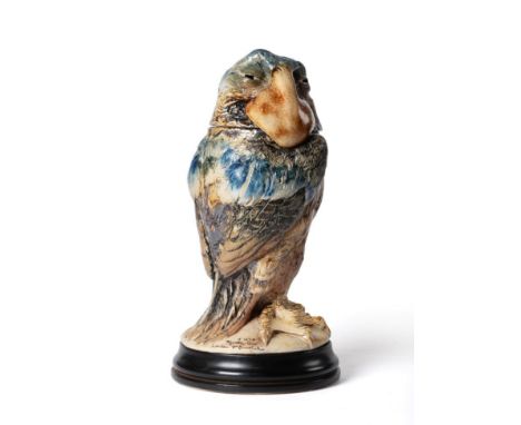A Martin Brothers Stoneware Bird Jar and Cover, by Robert Wallace Martin, modelled as a Sergeant-Major standing erectly with 