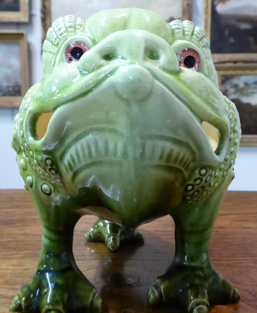 A Burmantofts Faience Pottery Grotesque Toad, modelled on three legs