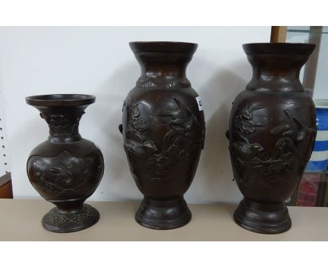 A pair bronze Oriental vases, height 30cm and a similar smaller vase (3).