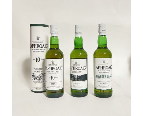 A collection of three Laphroaig bottles of whisky, including Laphroaig Islay single malt Scotch whisky Quarter Cask, 48% vol 