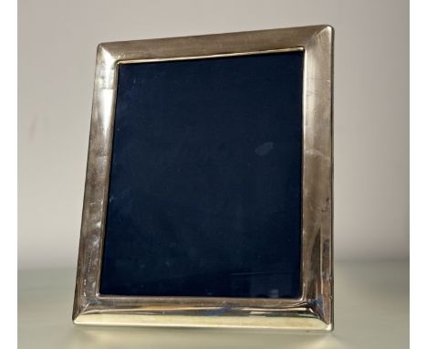 A large modern London silver photograph frame with blue velvet back and easel stand London 1989:  external h. x 31cm x w. x 2