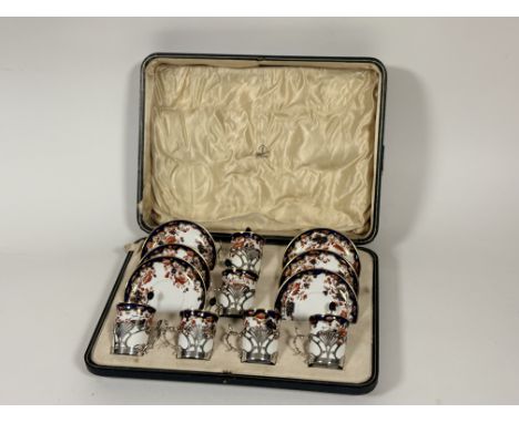 A cased Copeland Spode Imari pattern coffee set comprising, six saucers, six coffee cups with a RLM Sheffield 1894 silver hal