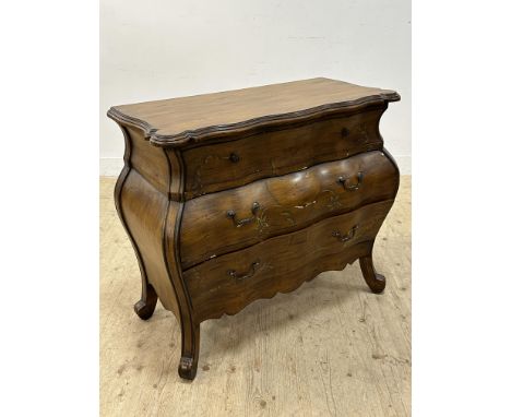 A reproduction Dutch style commode with painted distressed finish and floral swags to drawer fronts (h.86cm x l.96cm x w.48cm