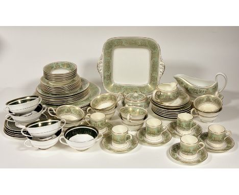 A Wedgwood Gold Cumbria Green Sage part dinner service comprising, a gravy boat and flat, eight teacups, six dinner plates, s