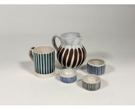 A collection of 1950's Striped Rye Pottery comprising, a set of three ramikens, one black striped other two blue striped, a b