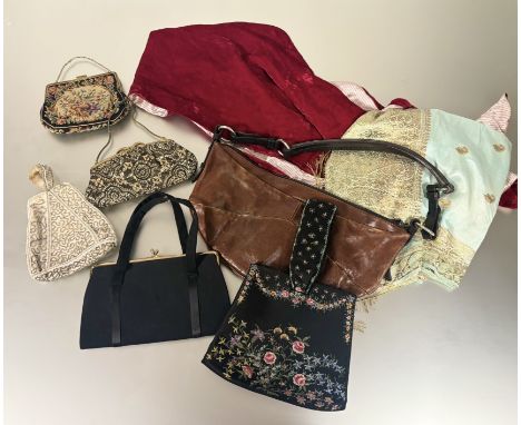 A mixed lot comprising an Yves Saint Laurent brown leather crescent shaped shoulder bag (a/f), a collection of vintage evenin