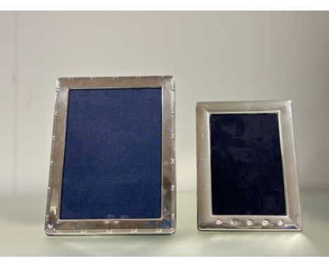 A modern London silver photograph frame with reeded border and velvet back and easel stand: external h. x 21.5cm x l. x 16.5c