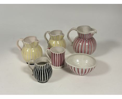 A collection of 1950's Striped Rye Pottery comprising, a pair of yellow and black stiped jugs (h-12cm), a black and blue stri